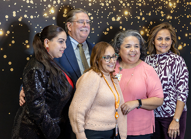 Group photo taken at retirement party.<br>Monica Sambrano, Dr. Donly, Clarice Perez, Patty Cerda-Arguijo, and Mabel Hernandez