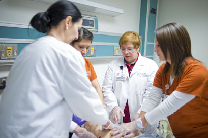 School of Nursing students being instructed in medical classroom setting