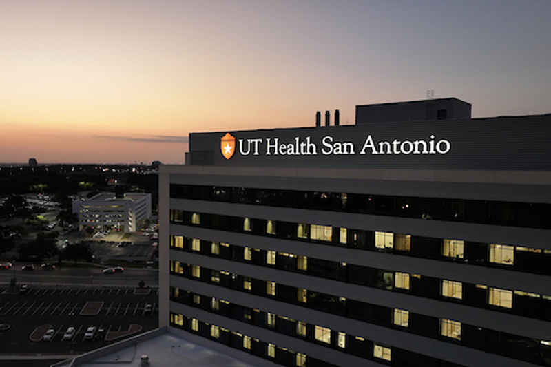 drone image of hospital building at sunset