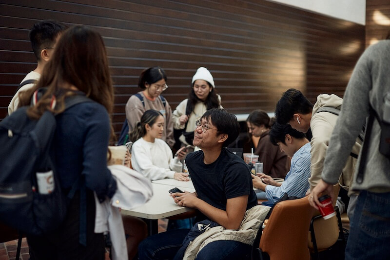Students gather in an indoor common space on the UT San Antonio Health Science Center campus.