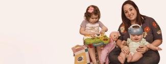 mother with baby wearing helmet and toddler